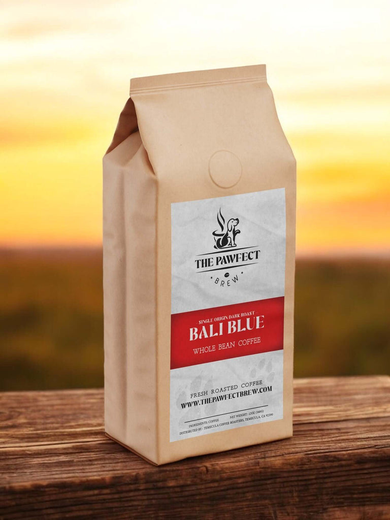 Bali Blue whole bean coffee bag with sunset background, highlighting its unique bluish hue.