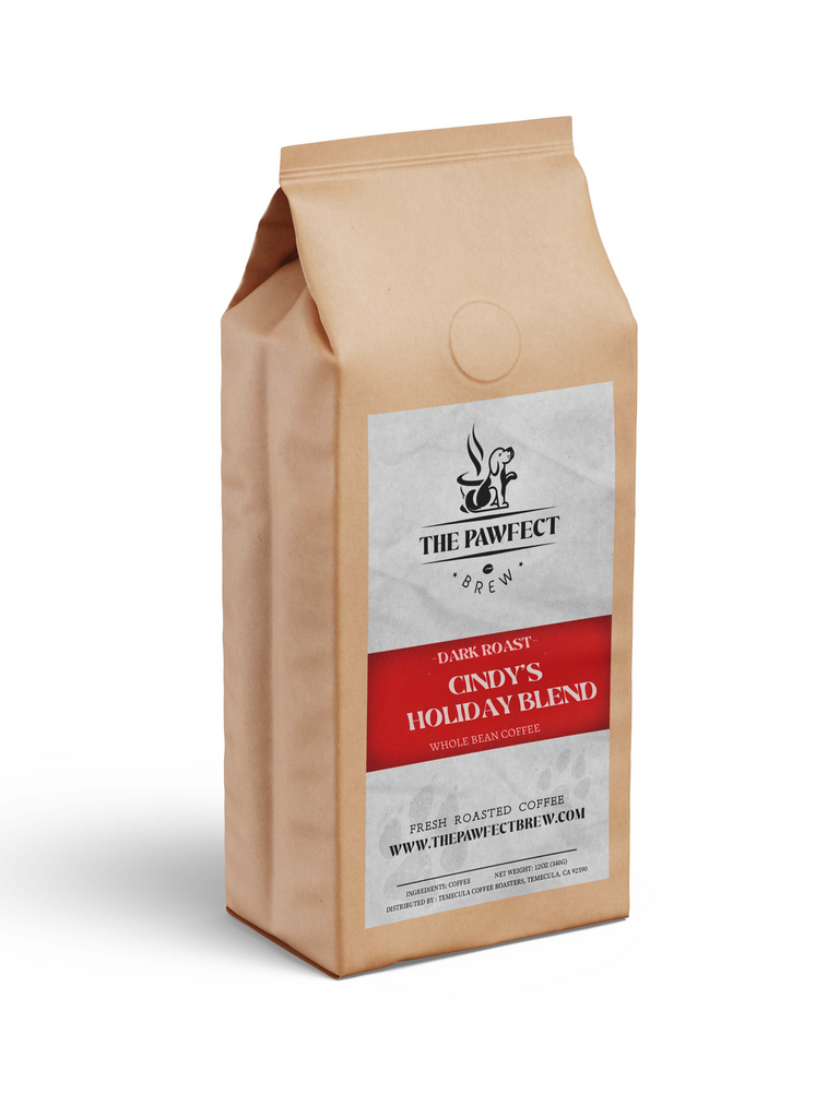 Cindy's Holiday Blend dark roast coffee bag with festive design for the holiday season.