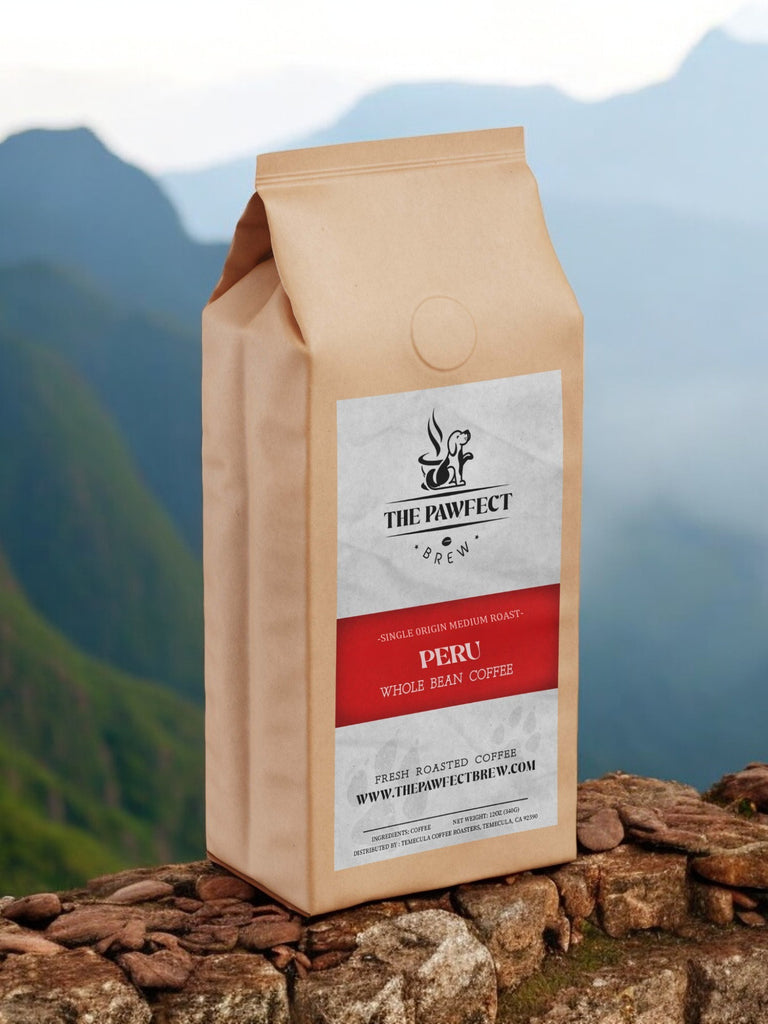 Peru whole bean coffee bag from The Pawfect Brew set against a scenic mountain backdrop.